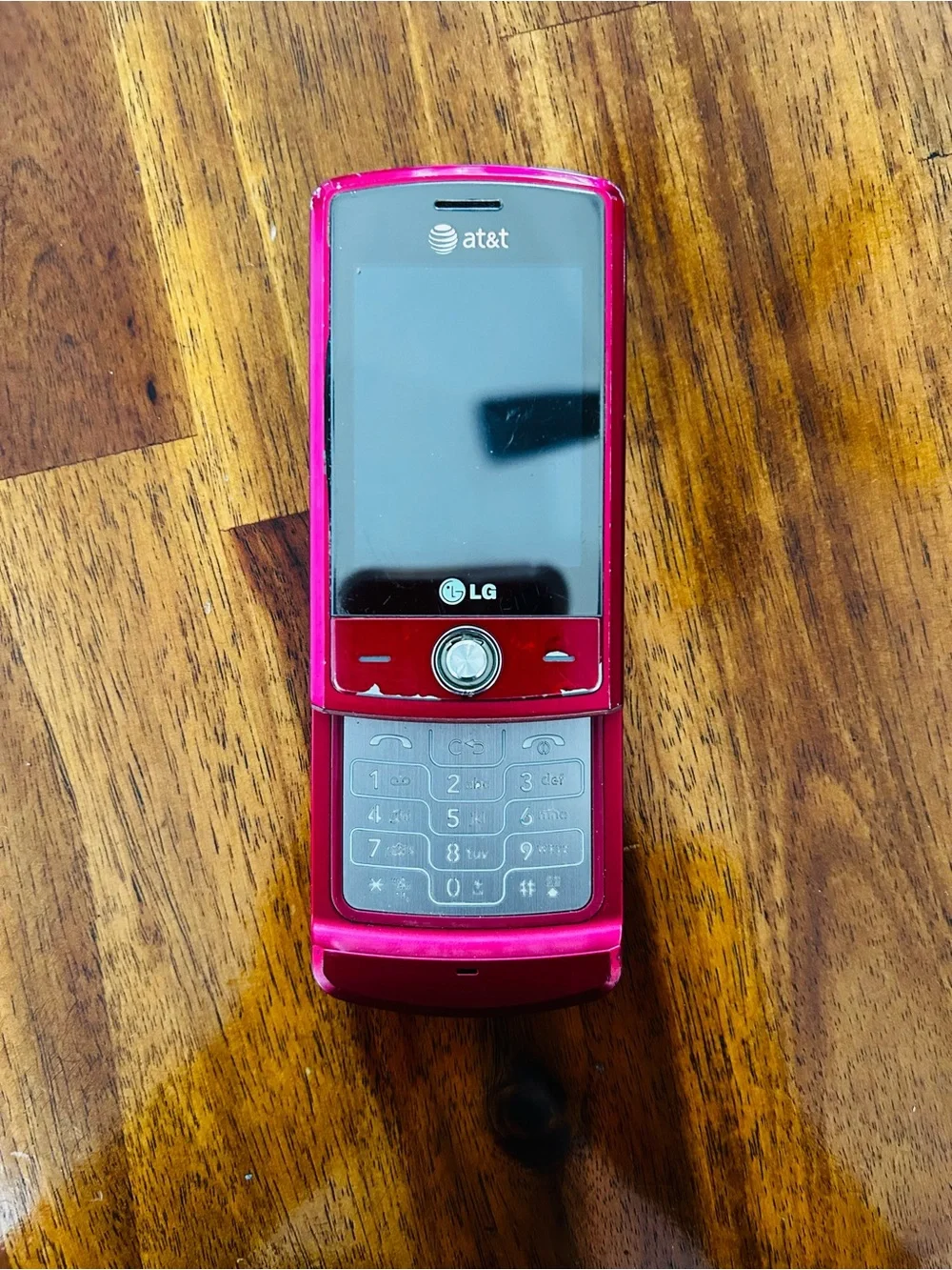 LG CU720 Red Slider Phone with Charger and Black Leather Holster